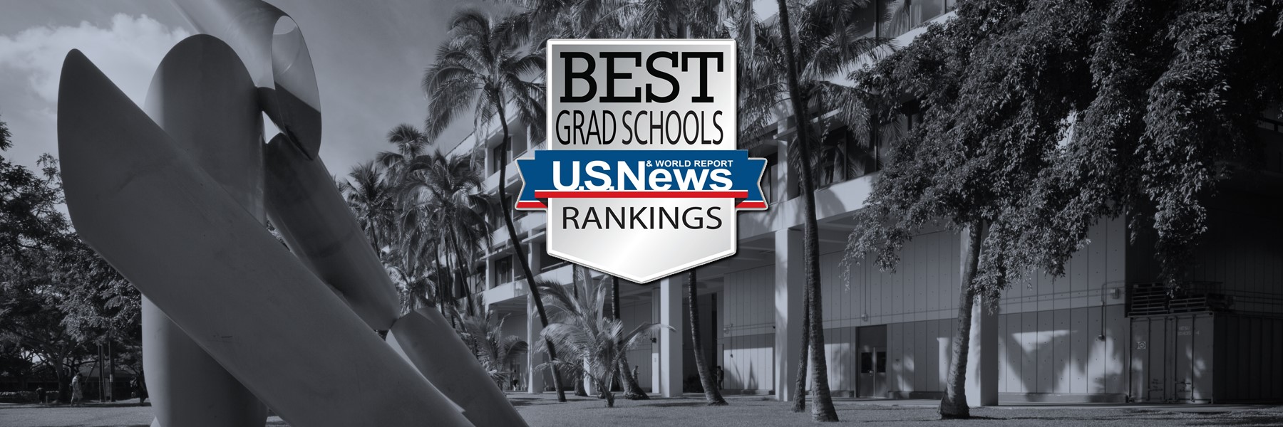 US News And World Report Rankings Badge Over An Unsaturated Photo Of Holmes Hall.