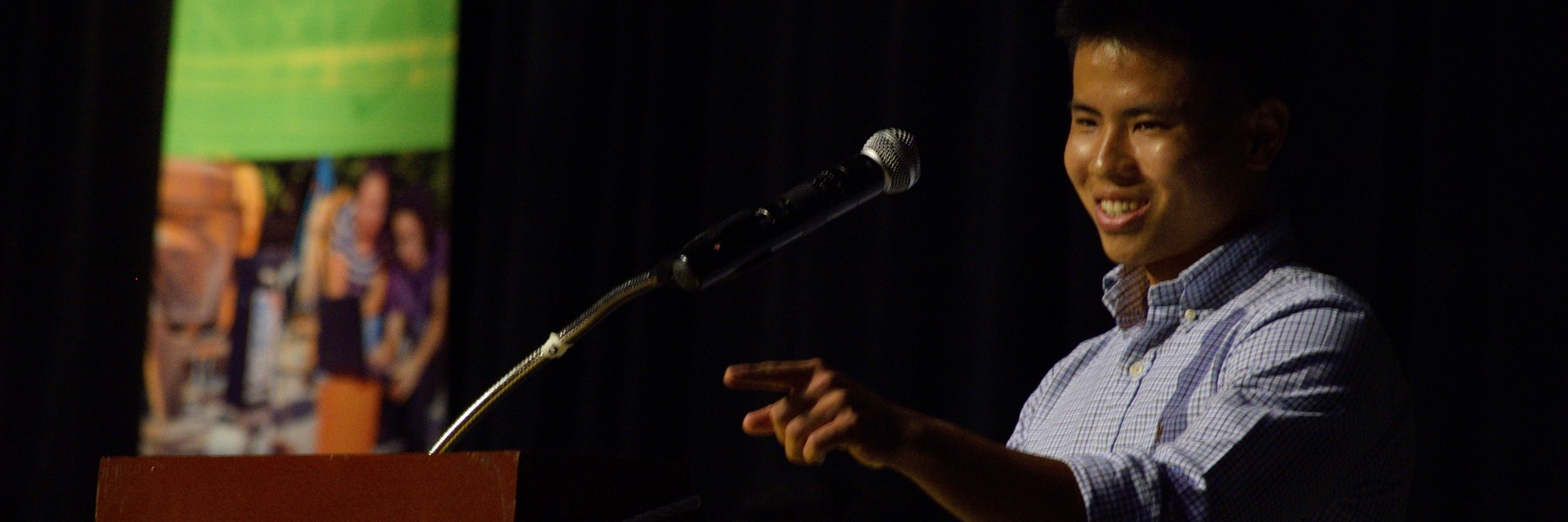 Trevor Shimokusu Speaking To The Crowd At Spring Convocation.
