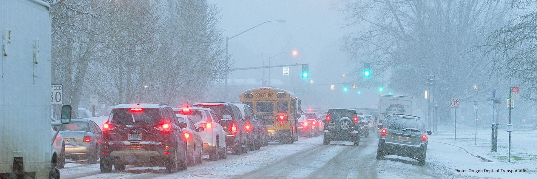 Cars Driving In Snow.
