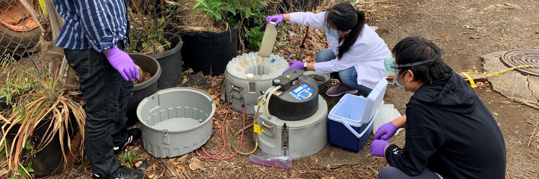 Engineering Students Handling Wastewater Samples.