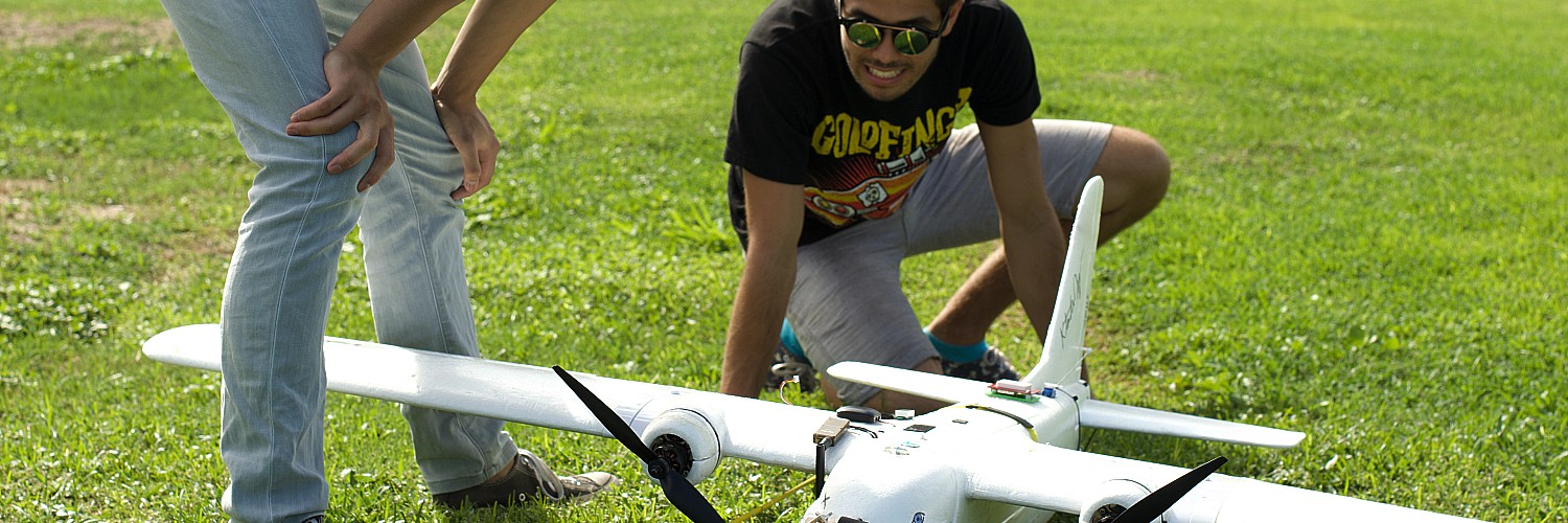 Student Preparing A Drone To Fly