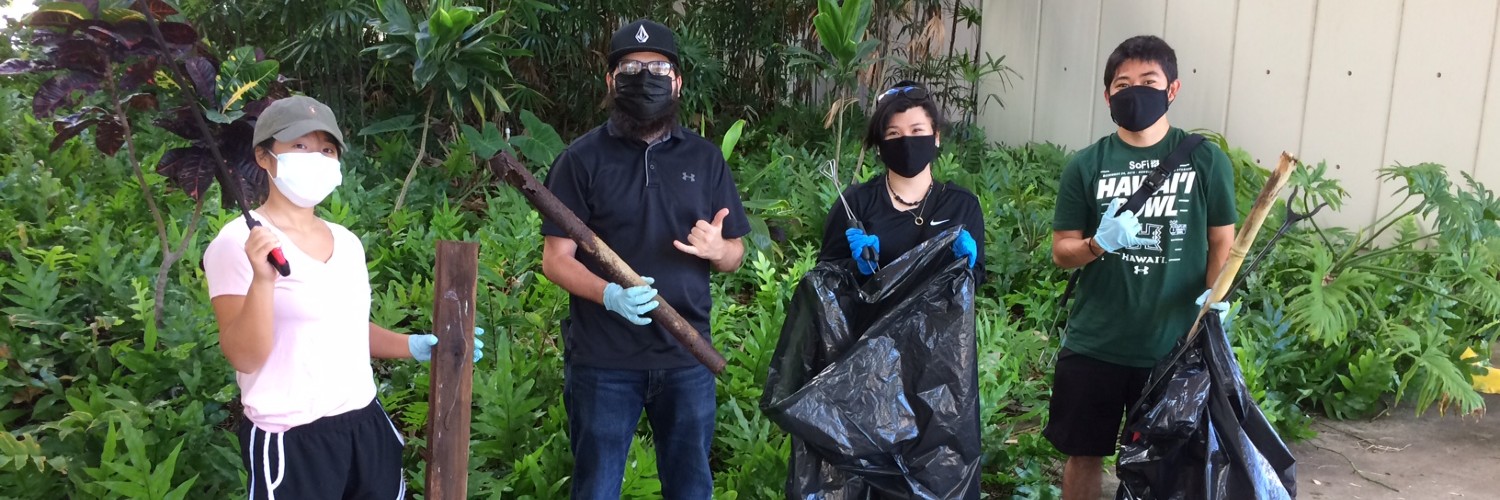 Group Of Students Holding Garbage Bags