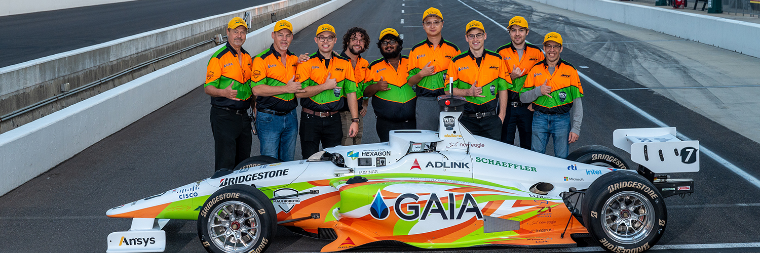 Students Posing With Their Car.