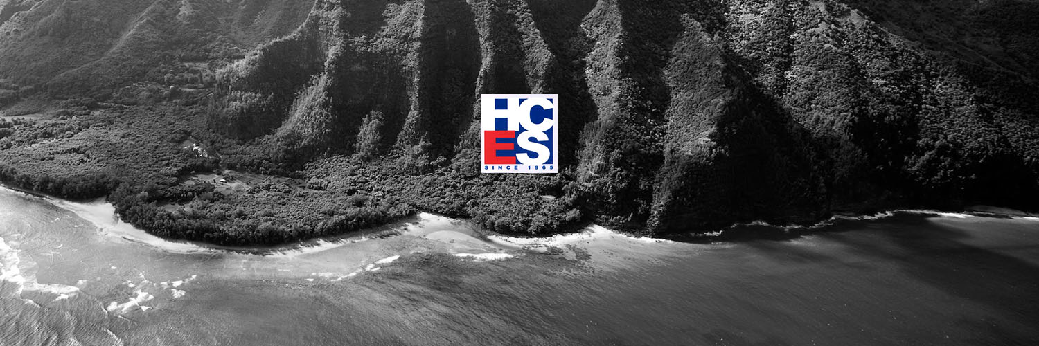 HCES Logo Over Scenic Photo Of Hawai'i Coastline
