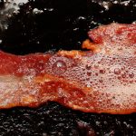 Bacon sizzling in a pan