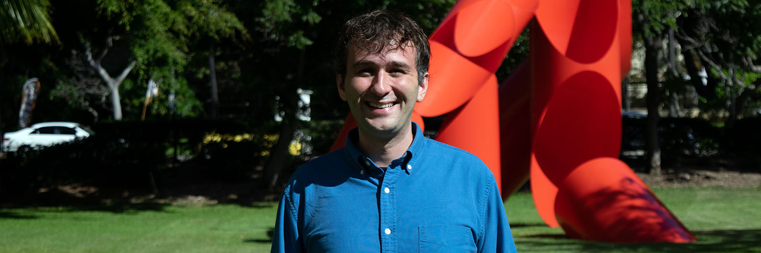 Prof. Ray Standing In Front Of Holmes Hall