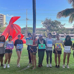 Wāhine Connect Students Posing With Their Paintings