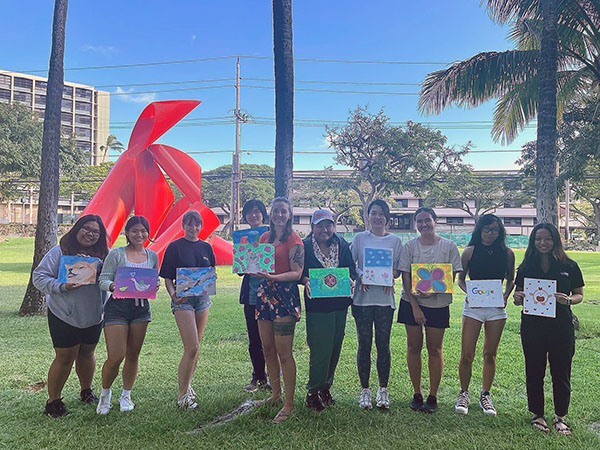 Wāhine Connect Students Posing With Their Paintings
