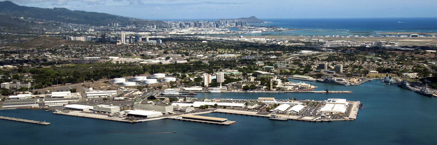Aerial Shot Of Joint Base Peal Harbor With Honolulu And Diamond Head In The Background