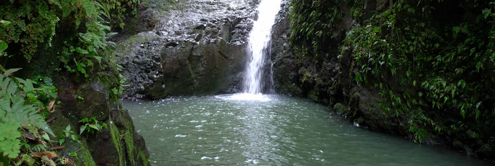 A Waterfall Feeding Into A Stream